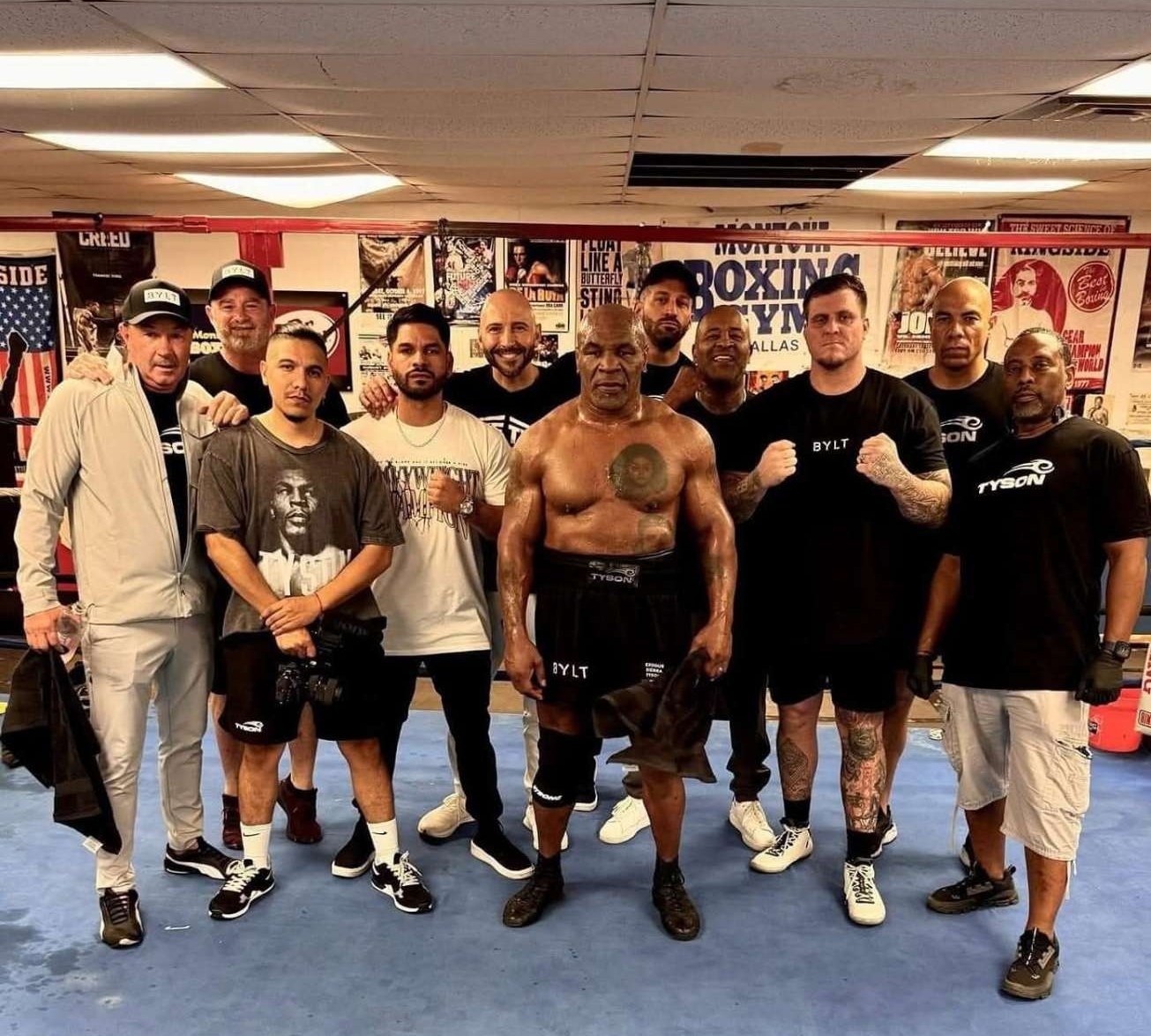 Mike Tyson and his team in the Montoya Boxing Gym ring